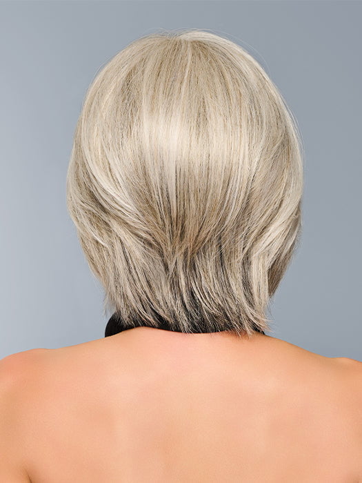 Model is wearing TAILORED ALLURE in color RL51/61 ICED GRANITA | Lightest Grey Progresses to a Deep Grey at the Nape