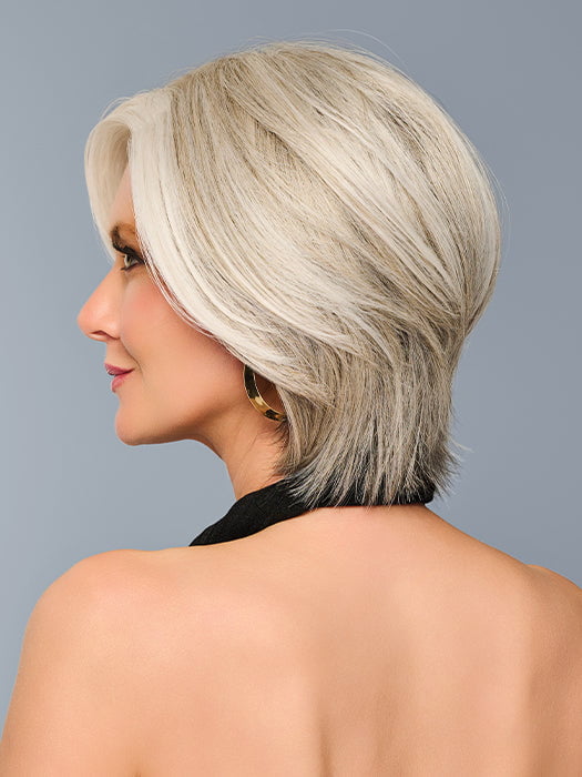 Model is wearing TAILORED ALLURE in color RL51/61 ICED GRANITA | Lightest Grey Progresses to a Deep Grey at the Nape