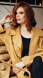 SIMMER ELITE PETITE by RAQUEL WELCH in RL32/31 CINNABAR | Medium Dark Auburn Evenly Blended with Medium Light Auburn (Model is wearing Simmer with a wefted back)