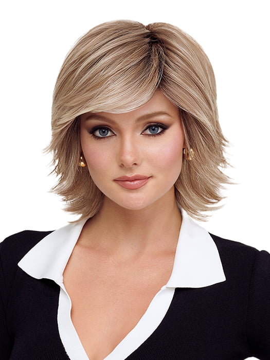 Model is wearing RAZOR CUT SHAG by TressAllure in 14/23/R8 | Light Brown blended with Platinum Blonde, Shaded with Dark Roots