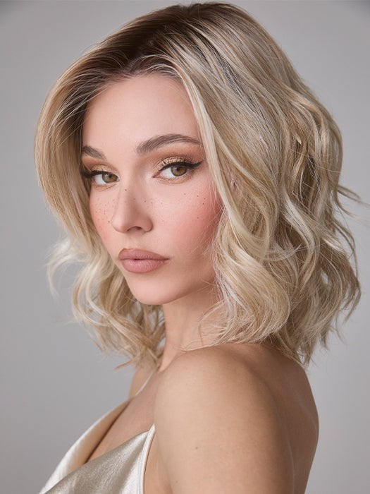 Model is wearing ROHAN by AMORE in color SEA SALT BLOND R |  A perfect mixture of cool, icy-blond and warm-dark blond. The rich brown root tone enhances the modern appearance.