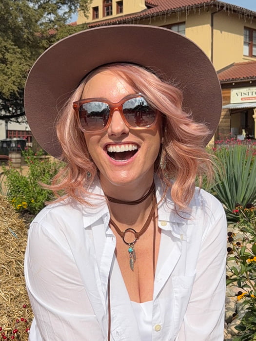 Carlyn @carlynwilson84 wearing ROHAN by AMORE in color WATERMELON-R | Rich Pastel Pink Base with Subtle Soft Reddish Tone and Soft Dark Brown Roots