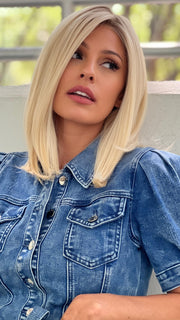 Roxie wearing UNDER CUT BOB by TressAllure in 24/102/R12 | Gold Blonde with Platinum Highlights
