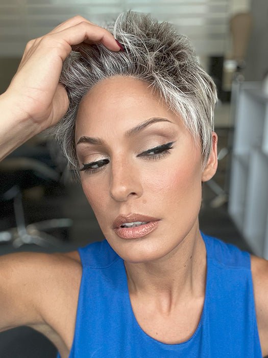 Model is wearing CHAT by ELLEN WILLE in color PEARL ROOTED | Pearl Platinum with Medium Ash Blonde and Lightest Brown with Grey Blend and Shaded Roots