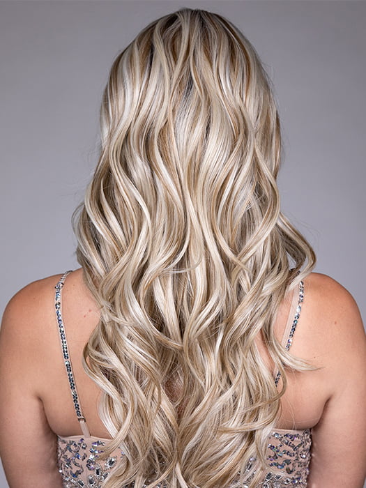 Model is wearing SOPHIA by BELLETRESS in color BUTTERBEER R | Dark Brown Base and Root that transitions smoothly into a buttery blonde, infused with creamy honey and toffee tones