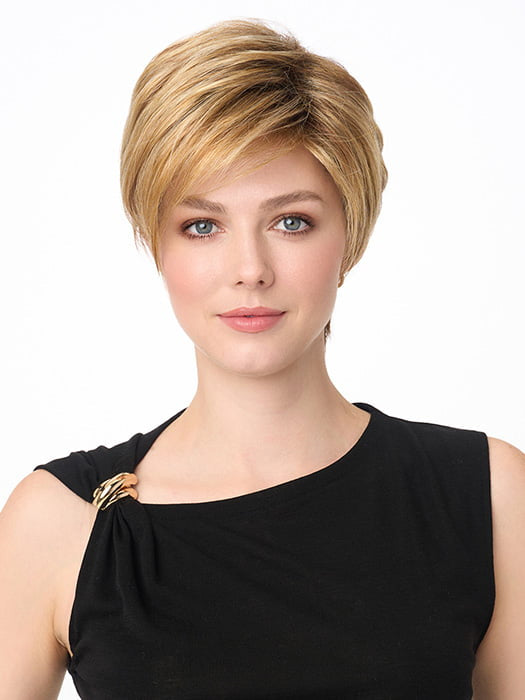 Model is wearing SHARI by ENVY in color GOLDEN NUTMEG | Medium Brown roots with overall Warm Cinnamon base and Golden Blonde highlights