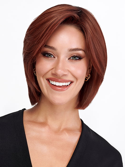 Model is wearing SHEER JOY by TRESSALLURE in color 33/130/R4 | Dark Auburn Bright Auburn Blend Rooted Dark Brown