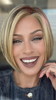 Model is wearing SHELBY by JON RENAU in color 24BT18S8 SHADED MOCHA | Medium Natural Ash Blonde & Light Natural Gold Blonde Blend, Shaded with Medium Brown