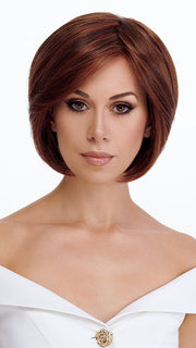 Model is wearing SMOOTH CUT BOB by TRESSALLURE in color 32/31 | Medium Red and Auburn blend