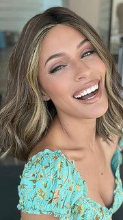 Model is wearin SOMERS by ESTETICA in color CKISSRT4 | Golden Brown with Copper Blonde Highlights and Dark Brown Roots