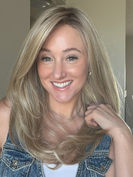Carlyn @carlynwilson84 wearing SPEARS by BELLE TRESS in color BUTTERCAKE BLONDE-R | A neutral-warm blonde blend featuring light brown, ash, and lightest blonde tones with natural-looking darker roots for added depth and realism.