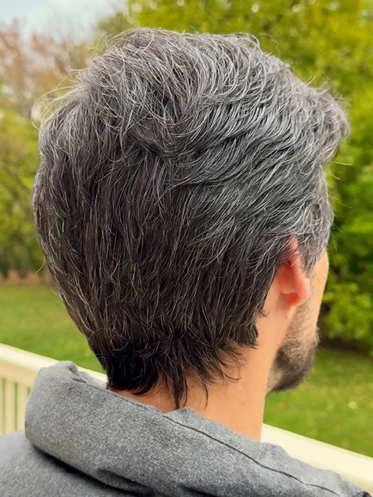 Model is wearing STYLE by HIM in color M280S - Darkest Brown With 20% Grey Blend