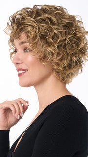 Model is wearing SUZI by ENVY in color FROSTED | Light Brown with Wheat Blonde blended highlights