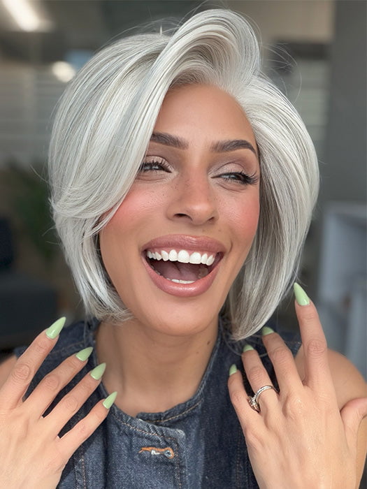 Model is wearing TAILORED ALLURE by RAQUEL WELCH in color TAILORED ALLURE in color RL51/61 ICED GRANITA | Lightest Grey Progresses to a Deep Grey at the Nape