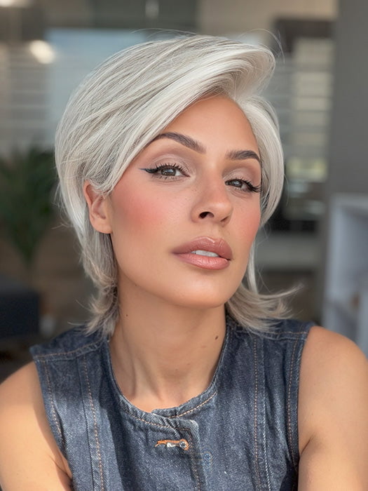 Model is wearing TAILORED ALLURE by RAQUEL WELCH in color TAILORED ALLURE in color RL51/61 ICED GRANITA | Lightest Grey Progresses to a Deep Grey at the Nape