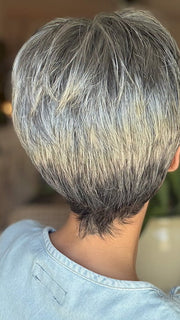 Roxie is wearing TESS by JON RENAU in color 92 MOONLIGHT | Pure White with 5% Medium Brown Front, Grey with 30% Medium Brown Middle, Dark Brown with 65% Grey Nape