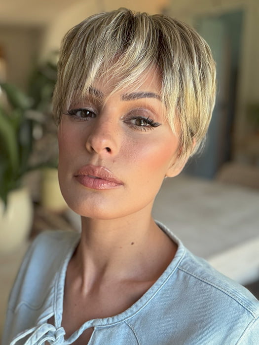 Roxie is wearing TESS by JON RENAU in color FS17/101S18 PALM SPRINGS BLONDE | Light Ash Blonde w/ Pure White Natural Violet, Shaded w/ Dark Natural Ash Blonde