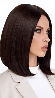 Model is wearing UNDERCUT BOB by TRESSALLURE in color 4/6R | Dark Brown