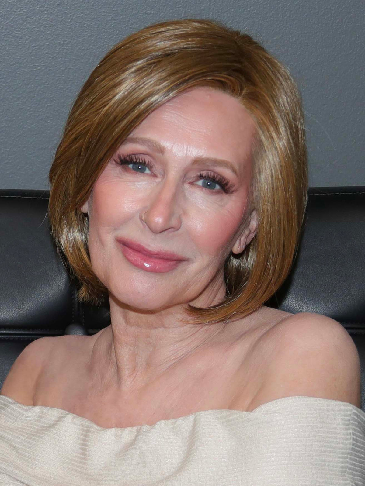 STRAIGHT UP WITH A TWIST by Raquel Welch in RL12/16 HONEY TOAST | Light Brown Evenly Blended with Dark Natural Blonde