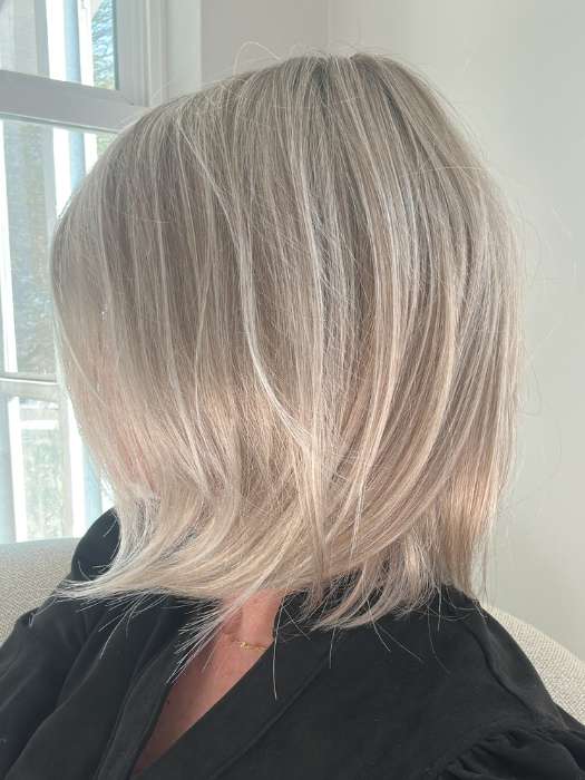 Emily Herrin @she_sheds_more wearing CAMERON PETITE by JON RENAU in color FS17/101S18 PALM SPRINGS BLONDE | Light Ash Blonde with Pure White Natural Violet Bold Highlights, Shaded with Dark Natural Ash Blonde