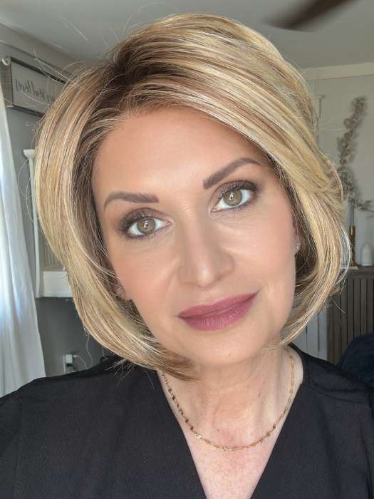 Emily Herrin @she_sheds_more wearing CHARLOTTE by TRESSALLURE in color EL12/22/8 | Light Golden Brown Evenly Blended with Platinum Blonde Highlights with Medium Brown Roots. PPC MAIN IMAGE