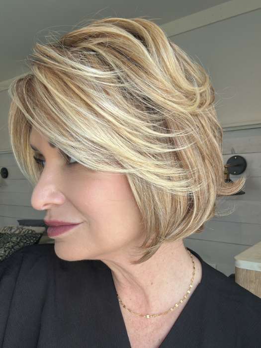 Emily Herrin @she_sheds_more wearing CHARLOTTE by TRESSALLURE in color EL12/22/8 | Light Golden Brown Evenly Blended with Platinum Blonde Highlights with Medium Brown Roots
