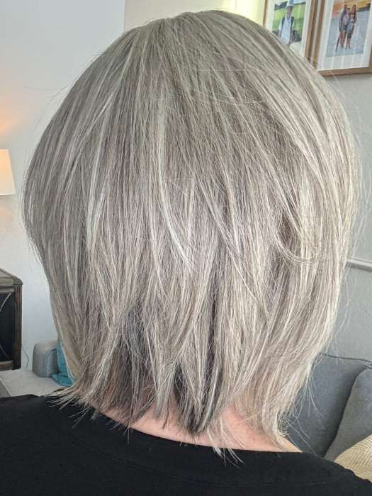 Mel B. @mels.be.ageless wearing MARA by BelleTress in shade OYSTER | A blend of Light Grey, Silver, White and with a Dark Gray Mix on the nape