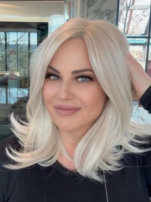 Sarah Engels @theatomicblondeco wearing SHOWRUNNER by RAQUEL WELCH in shade RL16/22 ICED SWEET CREAM | Pale Blonde with Slight Platinum Highlighting