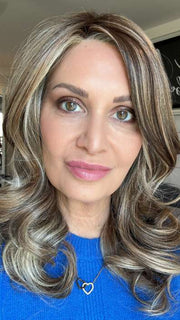 Emily H. @she_sheds_more wearing CAROLINE by BELLETRESS in color SUNKISSED ALMOND R | A blend of Medium and Light Brown with Light Gold Blonde Highlights and a hint of Cooler Blonde, rooted with Medium and Light Brown
