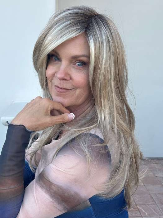 Susan Sparks @sparkles_intheworld wearing ANGELICA PM by NORIKO in color ARABIAN SAND™ | Neutral Chocolate Brown Roots fade into a Neutral Blonde Base, blended with Sandy, Chestnut, Golden, and Honey Blondes, with Soft Creamy Blonde Highlights and Face-Framing Lowlights