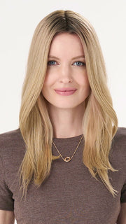 Model is wearing BARELY THERE STRAIGHT TOPPER in color VANILLA LATTE (17/101R8) | Rooted medium Blonde with Cool Platinum Dimension