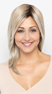 Model is wearing WHISPER by HENRY MARGU in color 10/613 | Light Ash Blonde with Platinum Blonde Highlights  