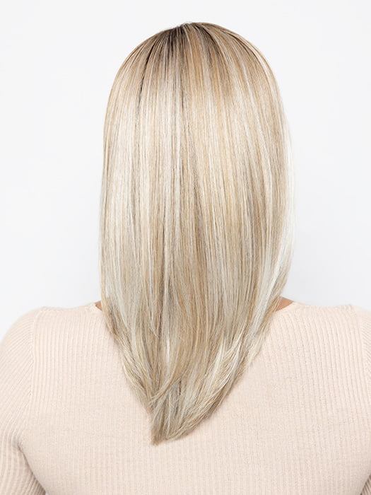 Model is wearing WHISPER by HENRY MARGU in color 10/613 | Light Ash Blonde with Platinum Blonde Highlights  