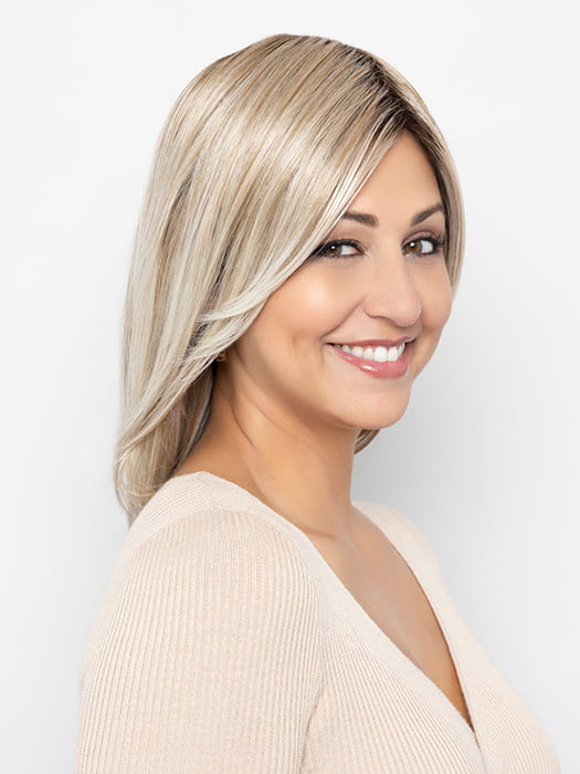 Model is wearing WHISPER by HENRY MARGU in color 10/613 | Light Ash Blonde with Platinum Blonde Highlights  