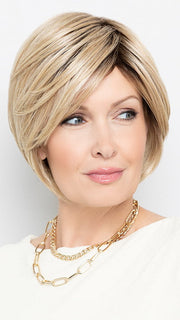 Model is wearing EDEN by HENRY MARGU in color 26GR | Brown Roots transition into a Golden Blonde base with Light Blonde Highlights   