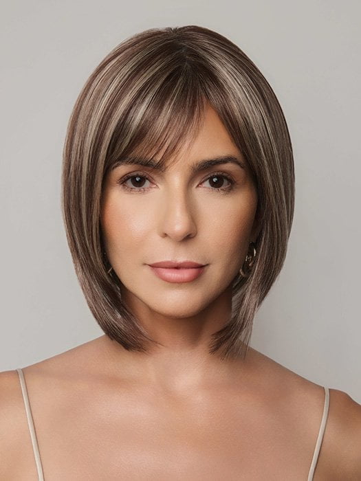 Model is wearing AMI by NORIKO in color SNOWY UMBER R | Medium Ginger Brown base with White Blond highlights
