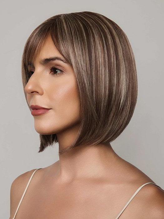 Model is wearing AMI by NORIKO in color SNOWY UMBER R | Medium Ginger Brown base with White Blond highlights
