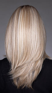 Model is wearing BAILEY by BELLETRESS in color BUTTERBEER R | Dark Brown Base and Root that transitions smoothly into a buttery blonde, infused with creamy honey and toffee tones