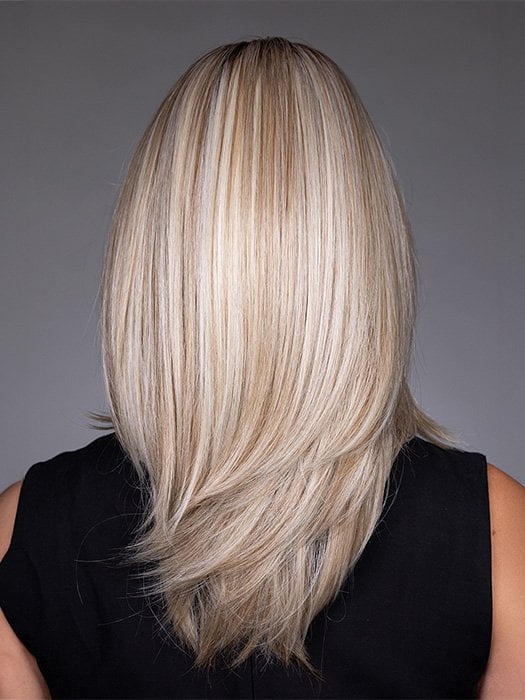 Model is wearing BAILEY by BELLETRESS in color BUTTERBEER R | Dark Brown Base and Root that transitions smoothly into a buttery blonde, infused with creamy honey and toffee tones
