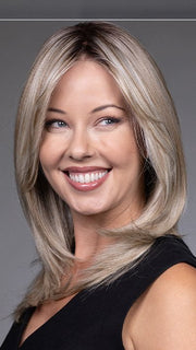 Model is wearing BAILEY by BELLETRESS in color BUTTERBEER R | Dark Brown Base and Root that transitions smoothly into a buttery blonde, infused with creamy honey and toffee tones