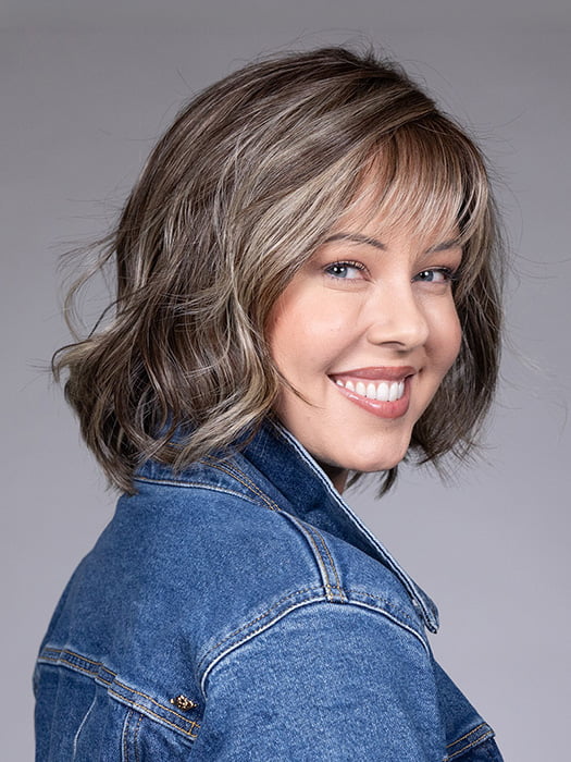 Model is wearing BUDAPEST by BELLETRESS in color BUTTERED-TOAST-R | A mix of Blonde and Brown tones