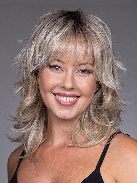Model is wearing FARRAH by BELLETRESS in color BUTTERBEER R | Dark Brown Base and Root that transitions smoothly into a buttery blonde, infused with creamy honey and toffee tones