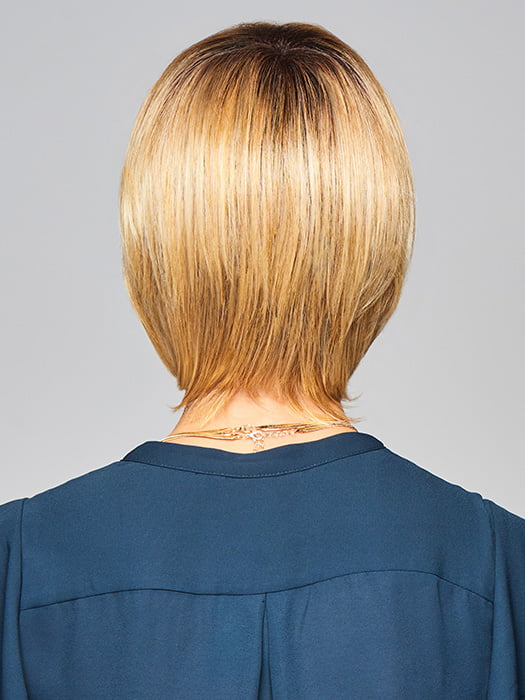 Model is wearing ENLIGHTEN by GABOR in color SS-MEDIUM-BLONDE | Medium Blonde with Warm Highlights & Dark Brown Roots