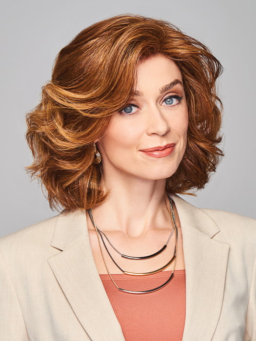 Model is wearing UNITY by GABOR in color MEDIUM-RED | Medium Reddish Brown with Subtle Copper Highlights