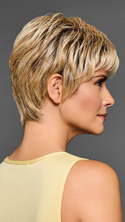 Model is wearing BOSS ENERGY by GABOR in color GF14-88SS GOLDEN WHEAT | Dark Blonde evenly Blended with Pale Blonde Highlights and Dark Roots