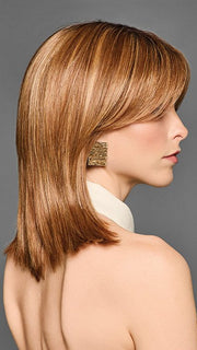 Model is wearing SERVING LOOKS by GABOR in color GF29-33SS ICED PUMPKIN SPICE | Strawberry Blonde shaded with Dark Red-Brown
