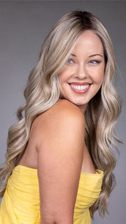 Model is wearing GISELE by BELLETRESS in color BUTTERBEER R | Dark Brown Base and Root that transitions smoothly into a buttery blonde, infused with creamy honey and toffee tones