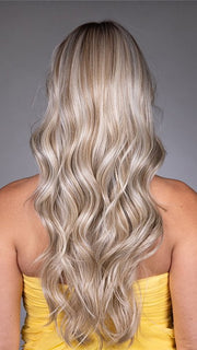 Model is wearing GISELE by BELLETRESS in color BUTTERBEER R | Dark Brown Base and Root that transitions smoothly into a buttery blonde, infused with creamy honey and toffee tones
