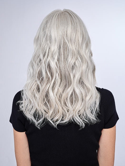 Model is wearing 16" AU NATUREL WAVES TOPPER by HAIRDO in color R56/60 SILVER MIST | Lightest Gray with 20% Medium Brown Evenly Blended with Pure White