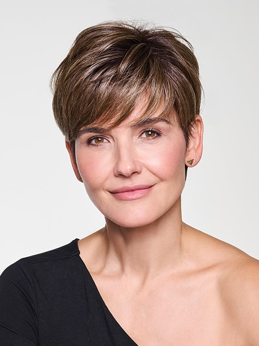 Model is wearing CROP CUT TOPPER by HAIRDO in color SS9/24 ICED CAFÉ LATTE | Dark Brown shaded with Golden Brown